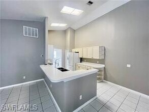 7786 Scarlet Ct in Naples, FL - Foto de edificio - Building Photo