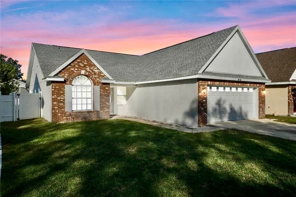 1122 Woodflower Way in Clermont, FL - Building Photo