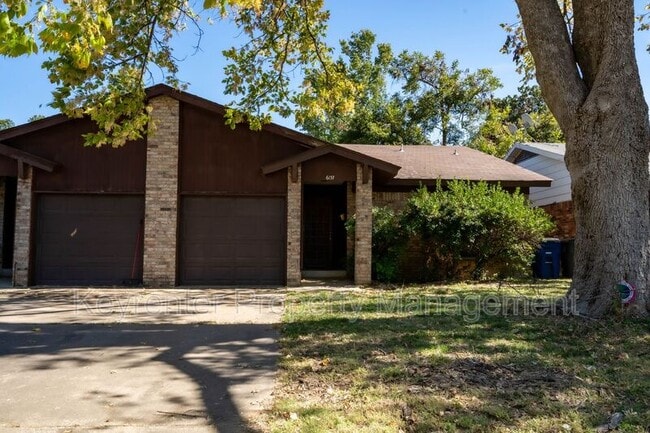 property at 6135 S Troost Ave