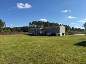 239 Road 5027 Rd in Cleveland, TX - Building Photo - Building Photo