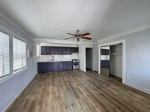 1234-1236 Rolland Curtis Pl in Los Angeles, CA - Building Photo - Building Photo