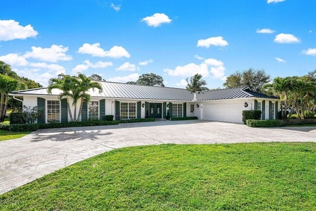 417 N Country Club Dr in Atlantis, FL - Building Photo - Building Photo