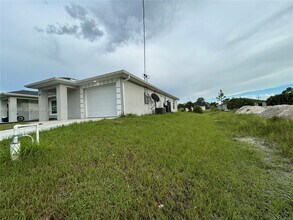 1110 Augusta St E in Lehigh Acres, FL - Building Photo - Building Photo