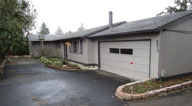 property at 8812 SE Rural St