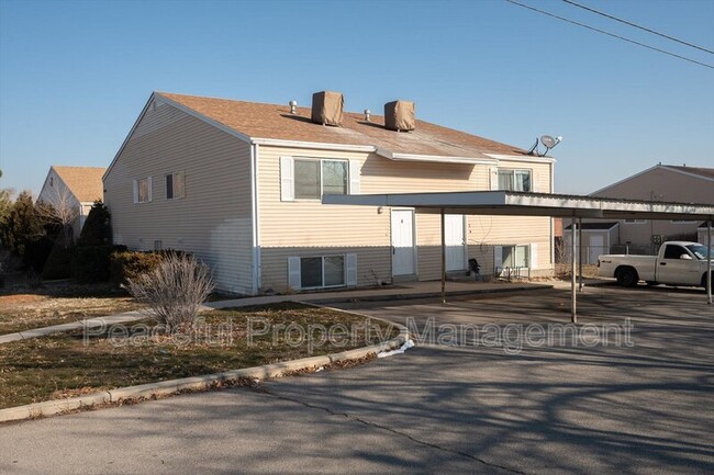 4693 S Arlington Park Dr in West Valley City, UT - Building Photo - Building Photo