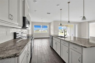 12329 Isabella Dr in Bonita Springs, FL - Building Photo - Building Photo