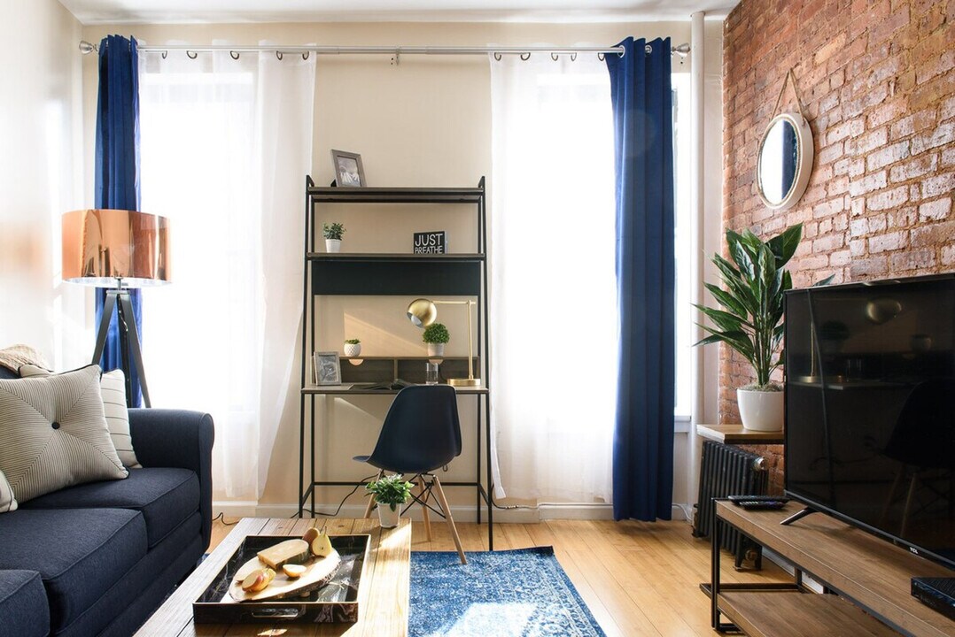 428-430-430 W 47th St in New York, NY - Building Photo