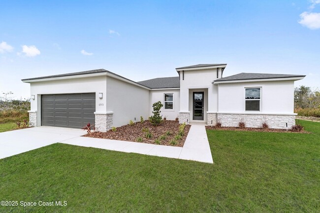 1080 St Johns St SE in Palm Bay, FL - Foto de edificio - Building Photo