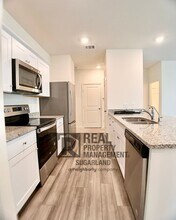 6330 Highland Bnd Dr in Richmond, TX - Building Photo - Building Photo