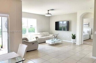 10817 Marble Brook Blvd, Unit 1204 in Lehigh Acres, FL - Building Photo - Building Photo