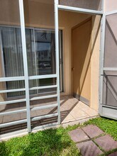 15888 SW 95th Ave, Unit 110 in Palmetto Bay, FL - Building Photo - Building Photo