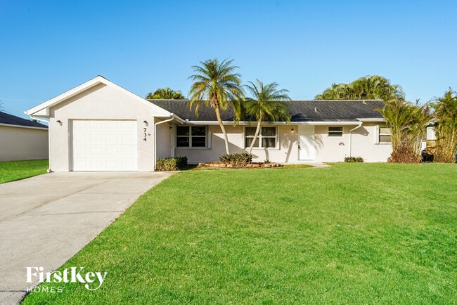 property at 734 SW Avens St
