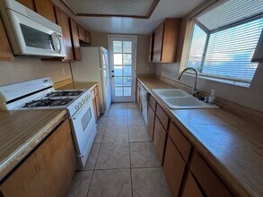 8256 Abercrombe Way in Las Vegas, NV - Building Photo - Building Photo