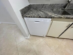 2100 Springdale Blvd, Unit 209 in Palm Springs, FL - Building Photo - Building Photo