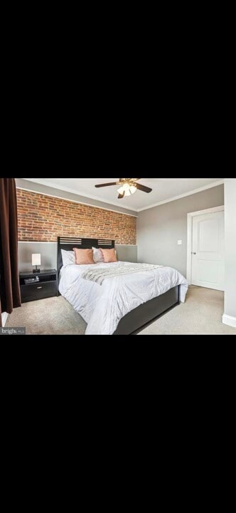 138 Rochester Pl, Unit Bedroom rear side in Baltimore, MD - Building Photo