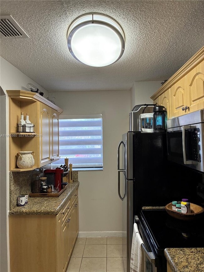 property at 6858 NW 173rd Dr