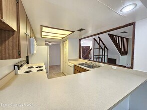 8779 Cocoa Ct in Cape Canaveral, FL - Building Photo - Building Photo