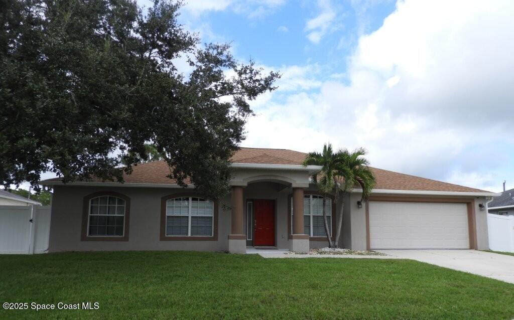 1535 Heartwellville St NW in Palm Bay, FL - Foto de edificio