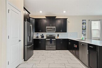 8842 Cabot Cliffs Dr in Kissimmee, FL - Building Photo - Building Photo