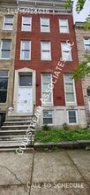 219 1/2 E North Ave in Baltimore, MD - Building Photo - Building Photo