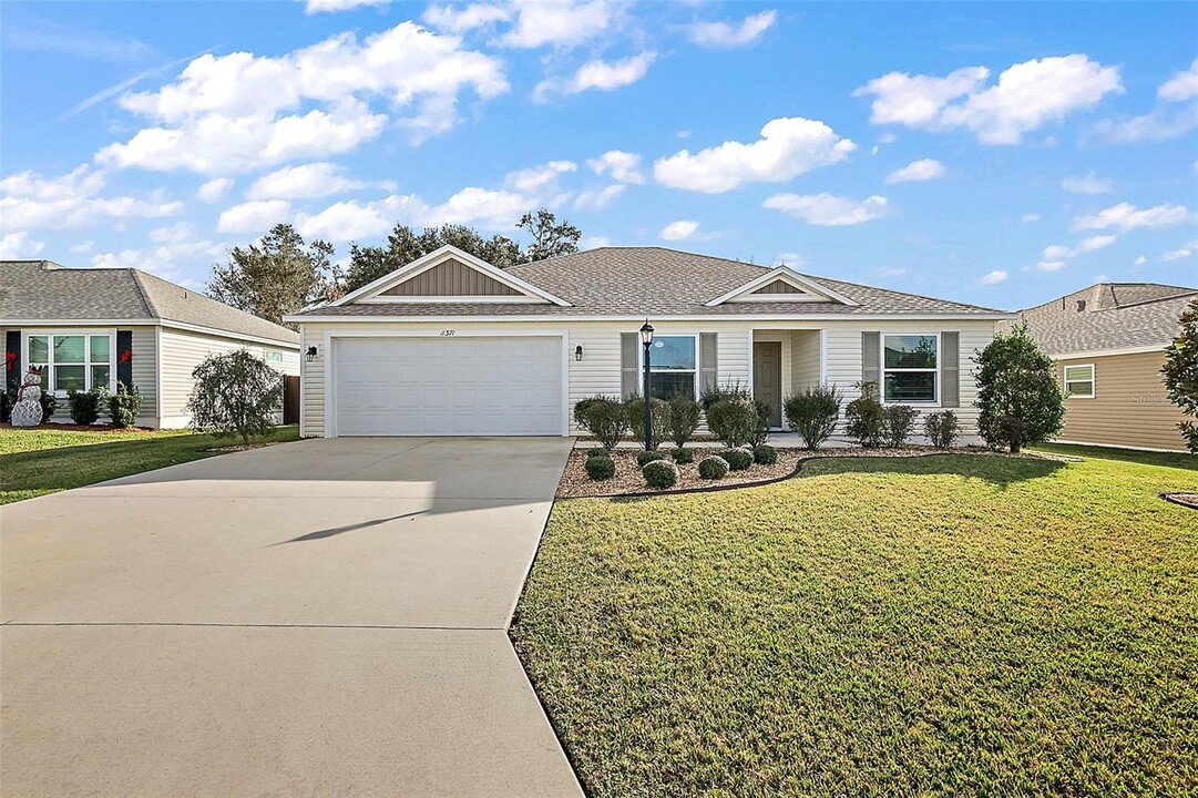 11371 Zimmerman Path in Oxford, FL - Building Photo