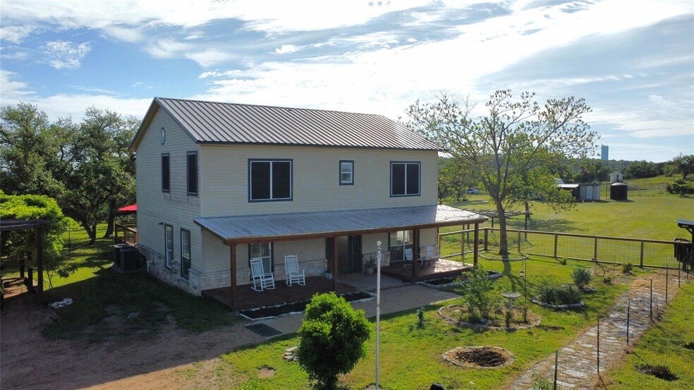 311 Harmon Hills Cove in Dripping Springs, TX - Building Photo