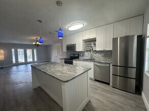 1047 Small Ct in Indian Harbour Beach, FL - Building Photo - Building Photo