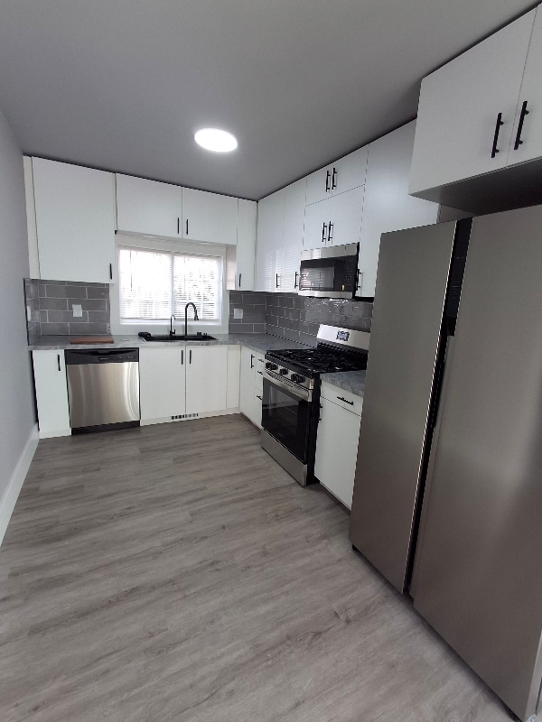 1434 Quarterline Rd in Muskegon, MI - Foto de edificio - Building Photo