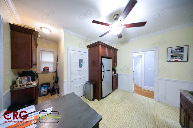 65 Olcott St, Unit #1 in Watertown, MA - Foto de edificio - Building Photo