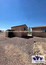 890 E Thorpe Ct in Pueblo West, CO - Building Photo - Building Photo