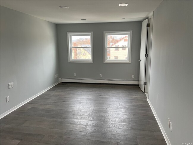296 Doherty Ave-Unit -1 in Elmont, NY - Building Photo - Building Photo