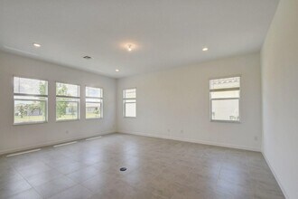 1048 Sterling Pine Pl in Loxahatchee, FL - Building Photo - Building Photo