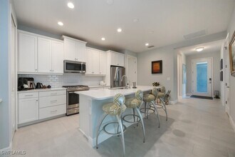 2401 Ariane Dr in Naples, FL - Building Photo - Building Photo