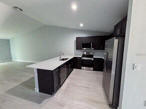 9497 Agate St in Port Charlotte, FL - Building Photo - Building Photo