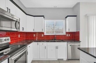 2565 River Woods Dr N in Canton Township, MI - Building Photo - Building Photo