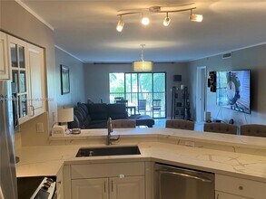 2205 S Cypress Bend Dr, Unit 302 in Pompano Beach, FL - Building Photo - Building Photo