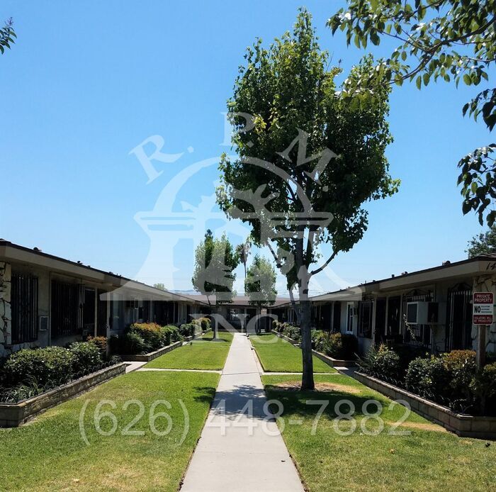 14428 Amar Rd-Unit -APT Q in La Puente, CA - Building Photo