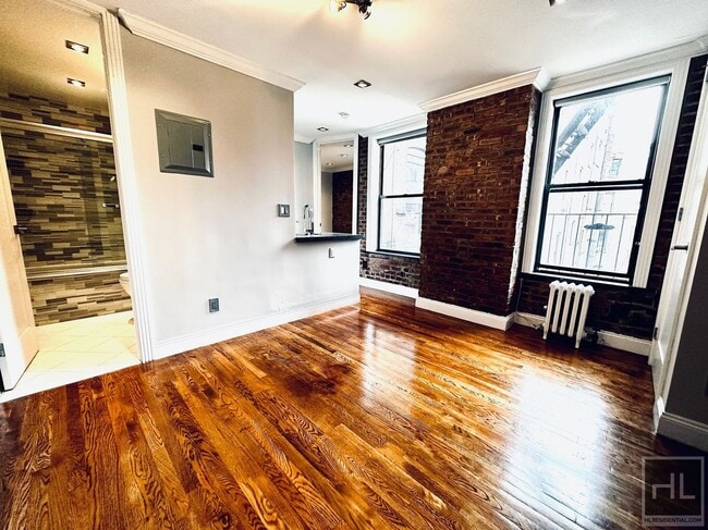 Sunny Nolita 1-Bedroom with Exposed Brick