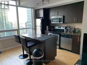 55-3055 Bremner Blvd in Toronto, ON - Building Photo - Building Photo