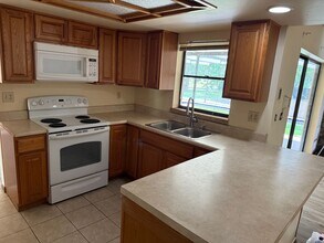 7446 Glasgow Rd in Weeki Wachee, FL - Building Photo - Building Photo