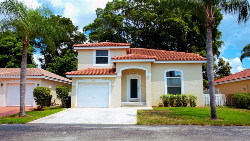 6054 NW 45th Way in Coconut Creek, FL - Building Photo