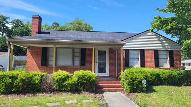 property at 1205 E 11th St