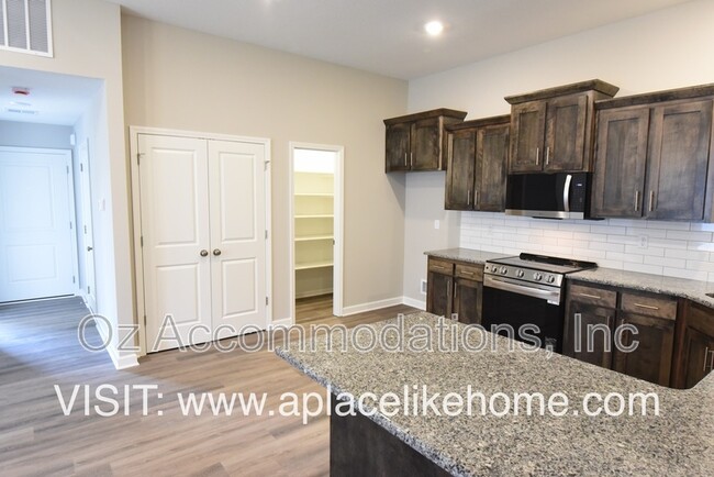 property at 20925 E 8th St S