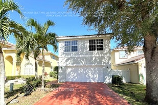 7775 Springfield Lake Dr in Greenacres, FL - Building Photo