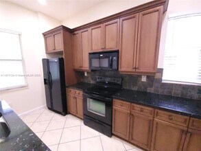 6033 NW 118th Dr in Coral Springs, FL - Building Photo - Building Photo