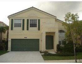 9829 Scribner Ln in Wellington, FL - Building Photo