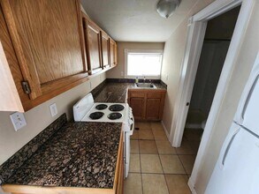 1587 W Nevada Pl in Denver, CO - Building Photo - Building Photo