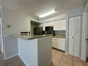 2213 Grand Cayman Ct, Unit 1121 in Kissimmee, FL - Foto de edificio - Building Photo