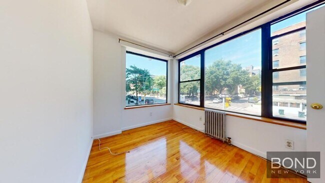 property at 299 E 11th St
