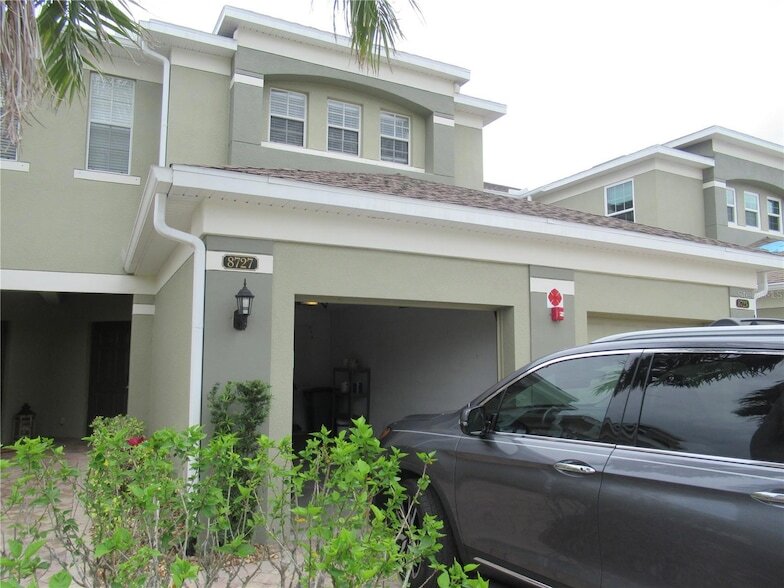 8727 Karpeal Dr, Unit 1005 in Sarasota, FL - Building Photo